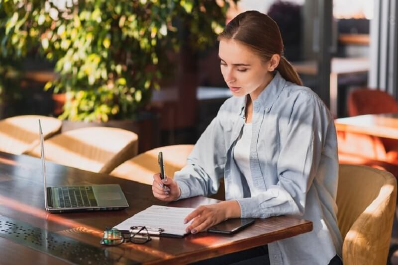 woman-writing-on-paper